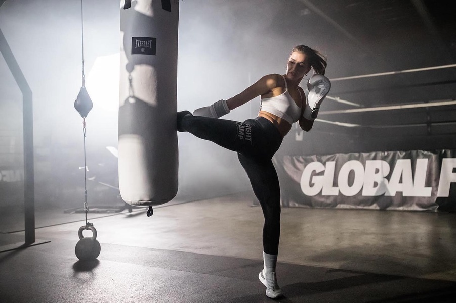 boxing gloves, punching bag gloves, martial arts gloves, kickboxing gloves, training gloves, combat sports gloves, brand awareness, product launch, lifestyle, editorial, energetic, bold, black, neutral